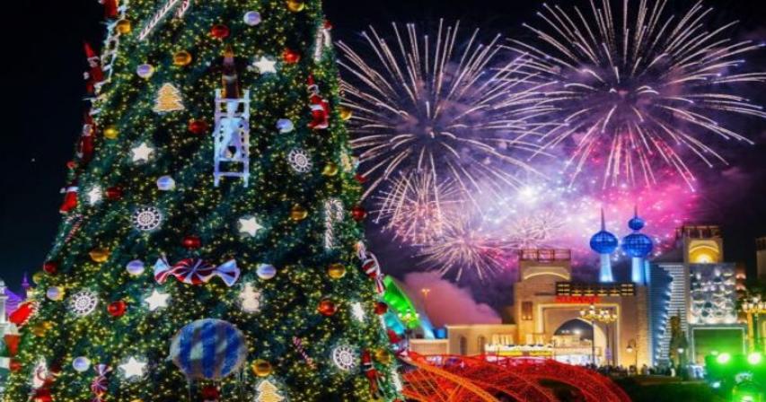 global-village-lights-its-famous-21-metre-high-festive-tree
